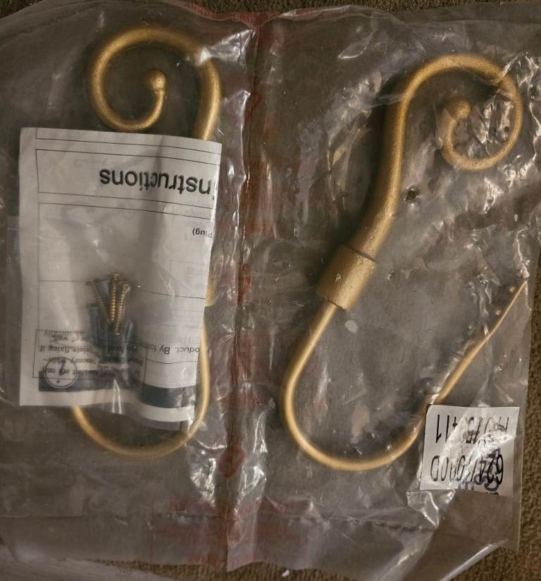 BRAND NEW Curtain holdbacks - Gold coloured