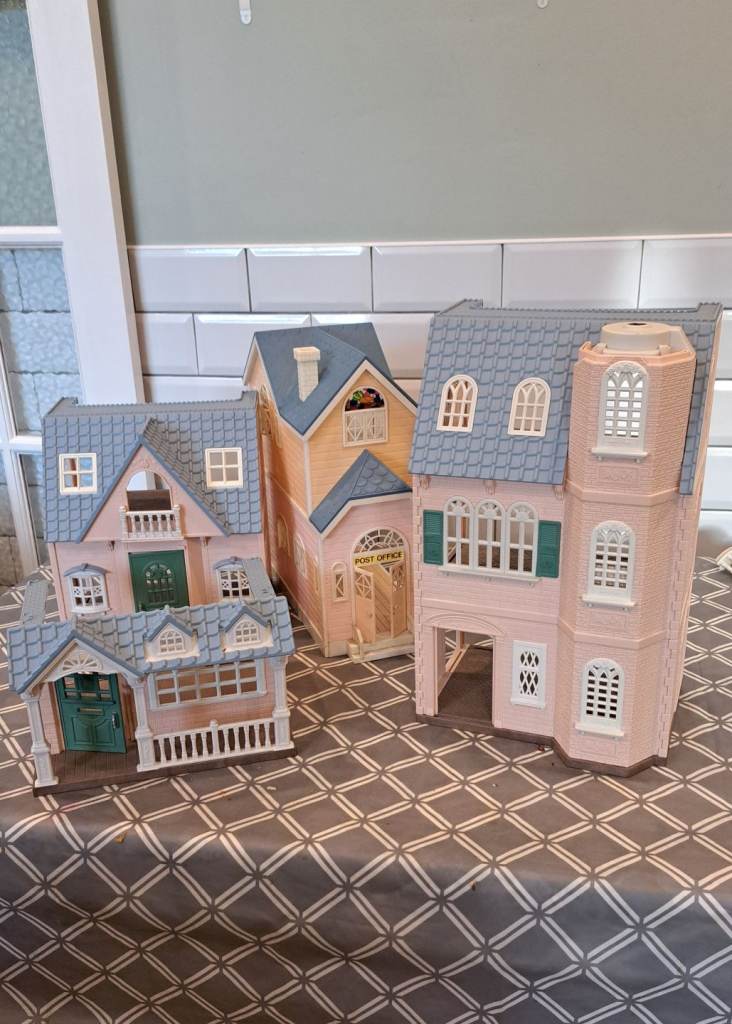 Four 'Sylvanian' houses with furniture