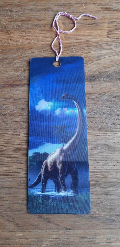 Hollographic 3d dinosaur book mark used