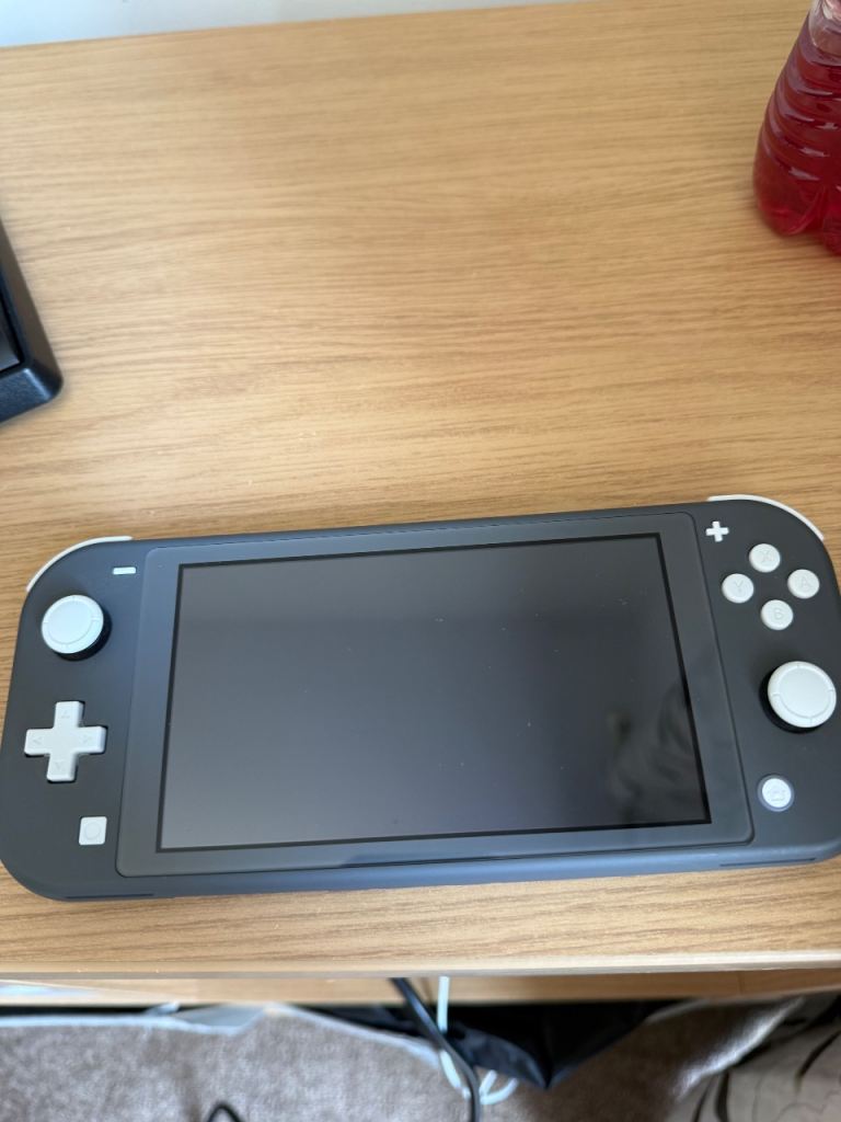 Nintendo Switch Lite Grey – Excellent Condition