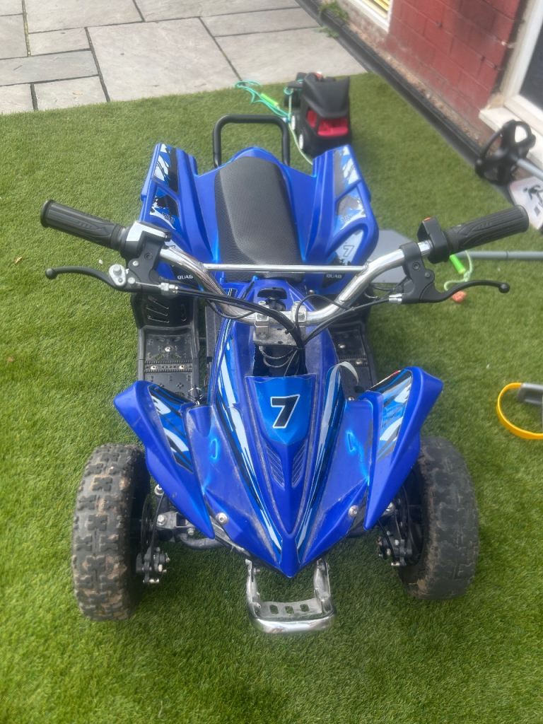 Blue electric kids quad Spares and repairs or can be fixed 