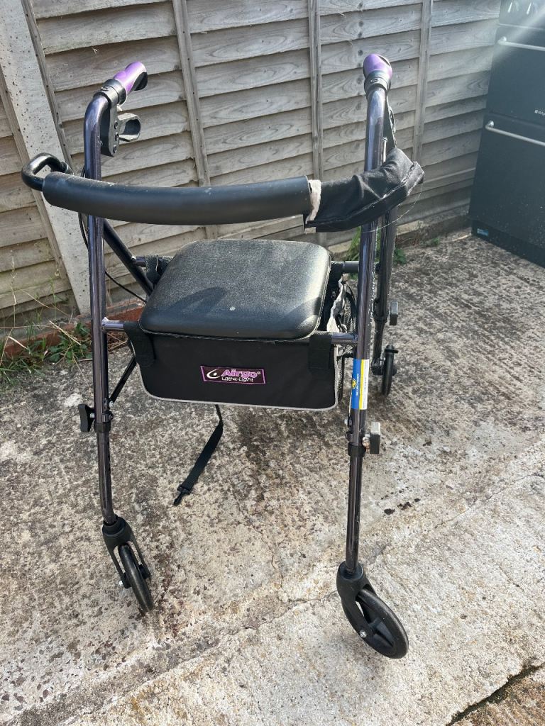 Mobility walking aid with 4 wheels, chair and seat