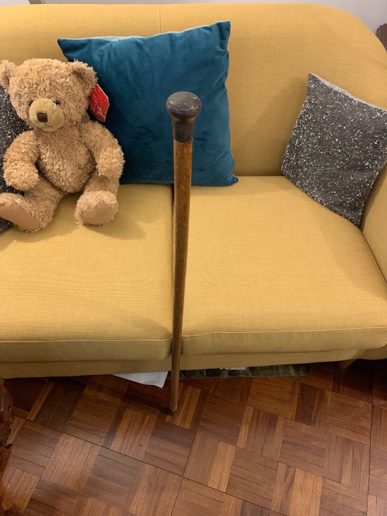 Antique walking cane, with silver hallmarked top.