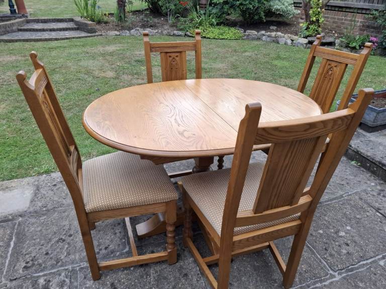 Oval wooden table and chair set