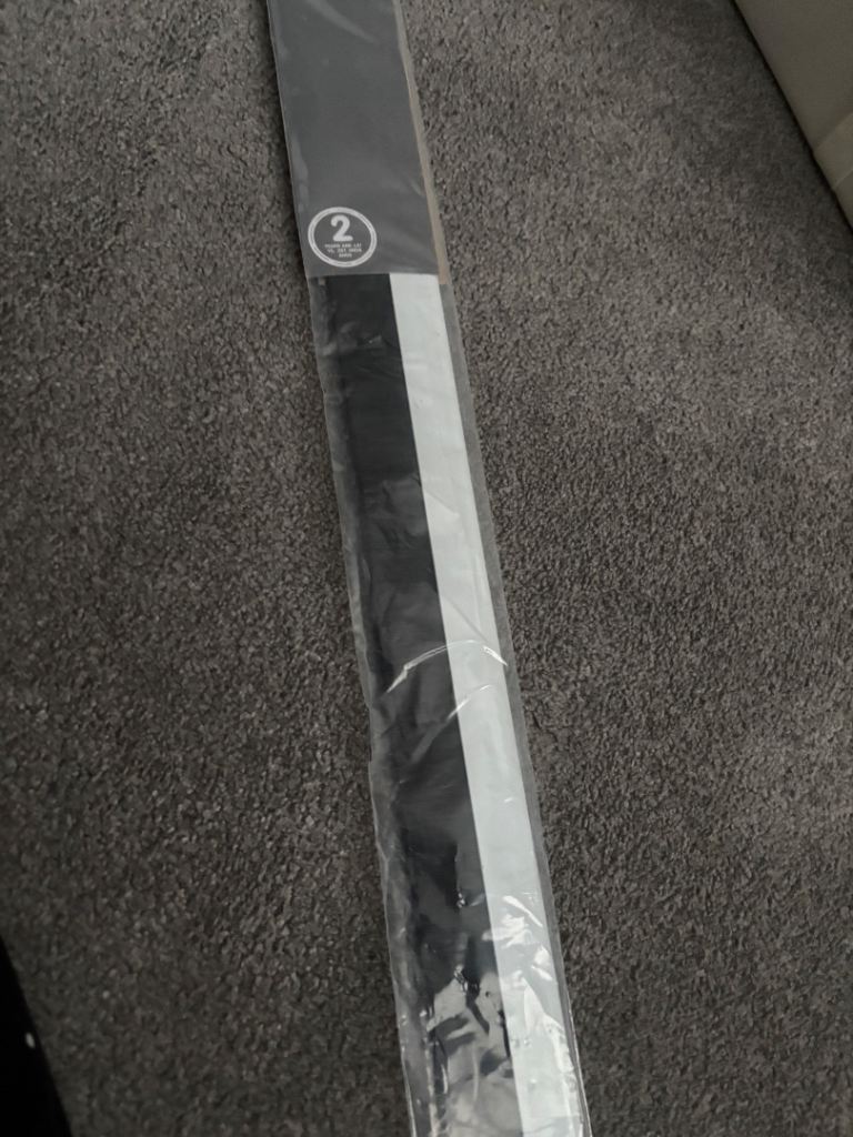 Door draught excluder bar