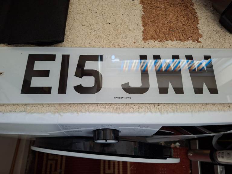 PERSONAL CAR NUMBER PLATE E15JWW ON RETENTION CERTIFICATE. 