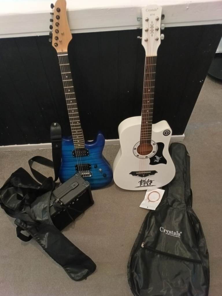 Acoustic and Electric Guitars with Bags and Small Amp