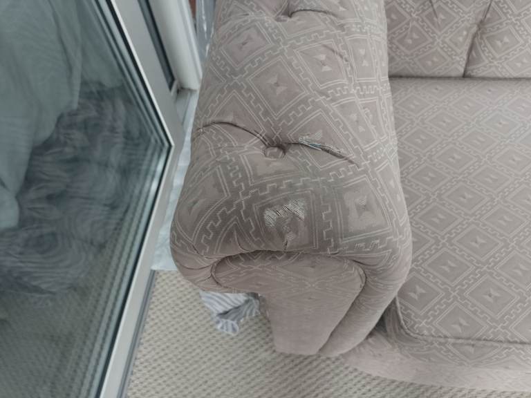 Sofa needing reupholstery