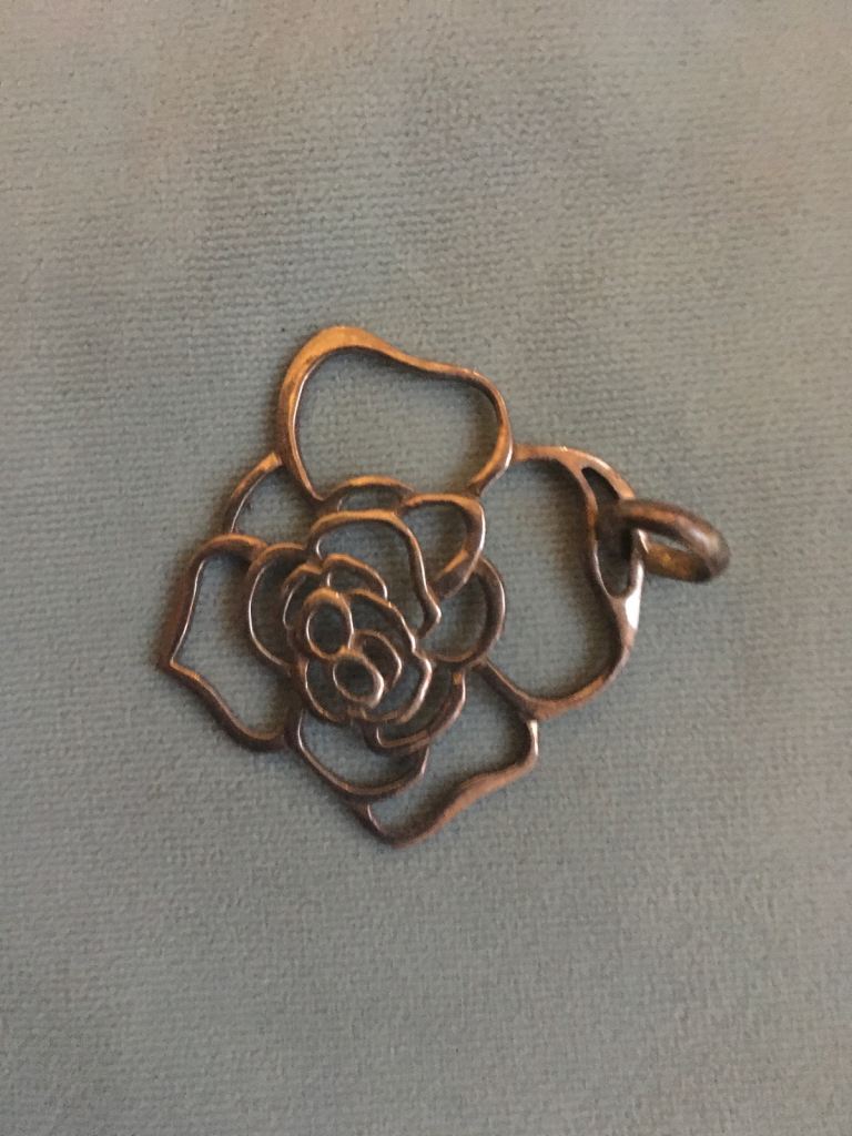 Silver flower pendant
