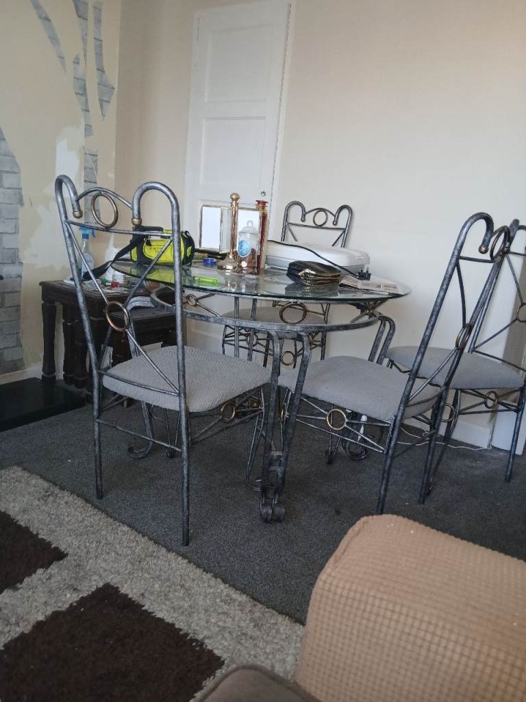 Glass Top Dining Table with 4 Metal Chairs – Good Condition