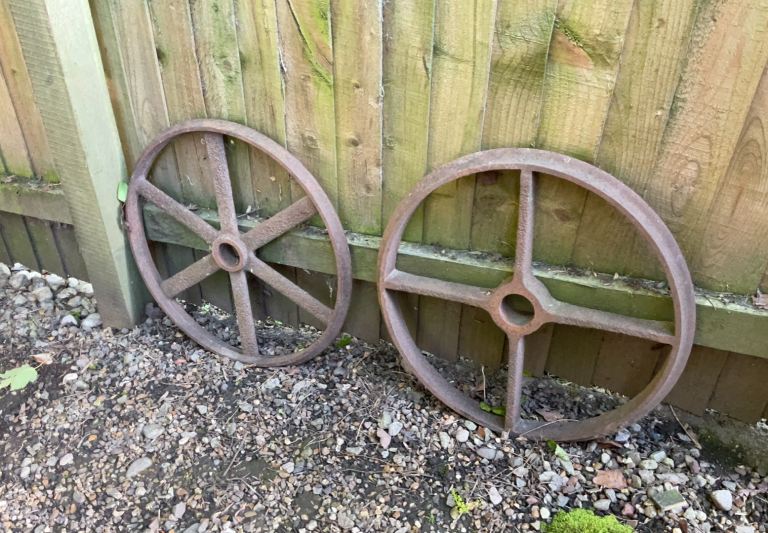 4 cast iron wheels and wheel with wooden handle