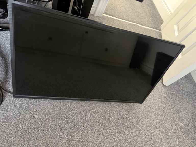 Sharp 32” Smart TV (LC-32CFG6351K) – Wall Mount Ready – No Stand