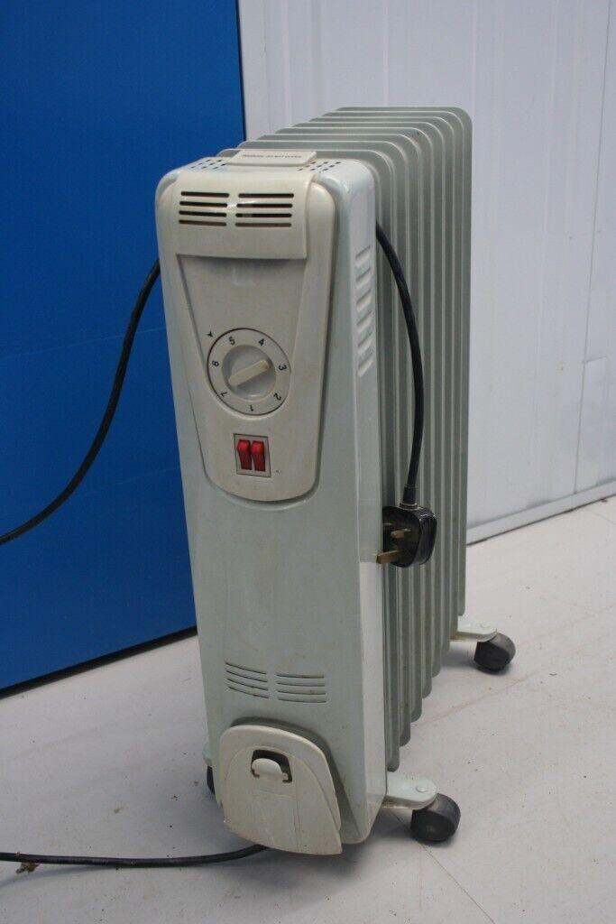 Plug in oil radiator - heats up then you can turn it off for 30m before being cold, house, home