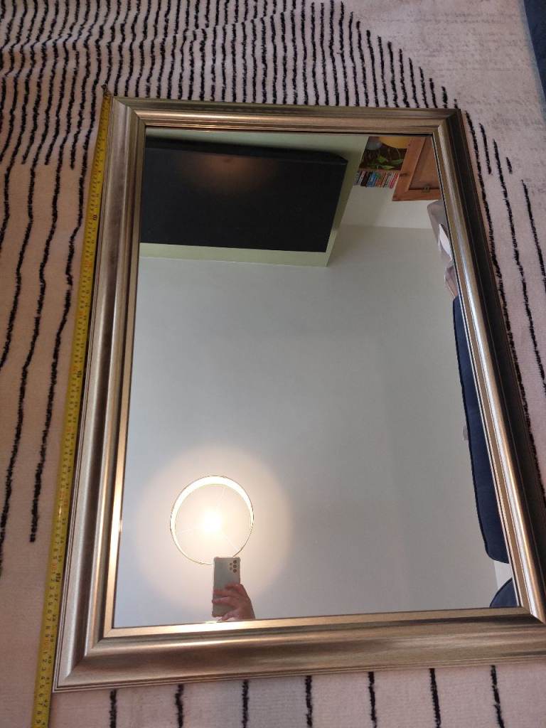 Mirror with gold frame 