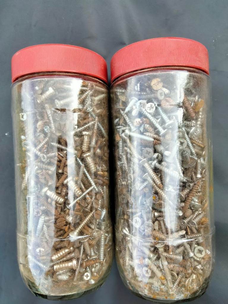 Two Jars of Assorted Screws and Fixings