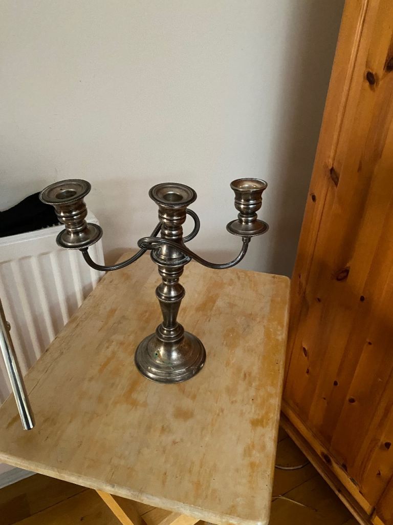 Silver candle with three stands