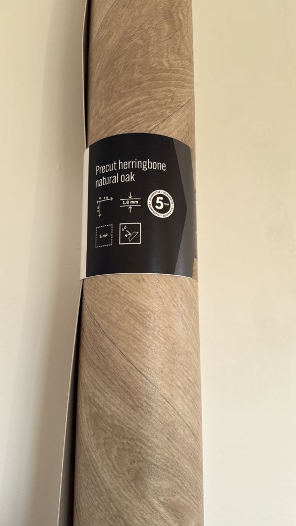 Vinyl floor wrap with unused instant contact adhesive 