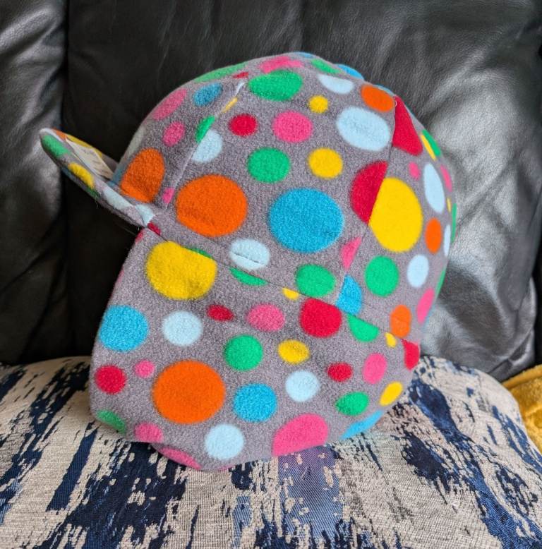 Cosy Spotty Fleece riding hat cover.