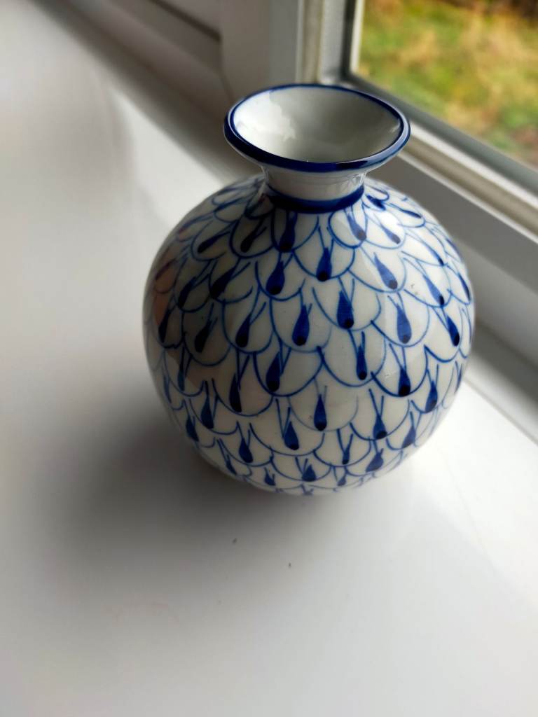 Cute Round Baseball Vase is a cute little baseball shaped vase