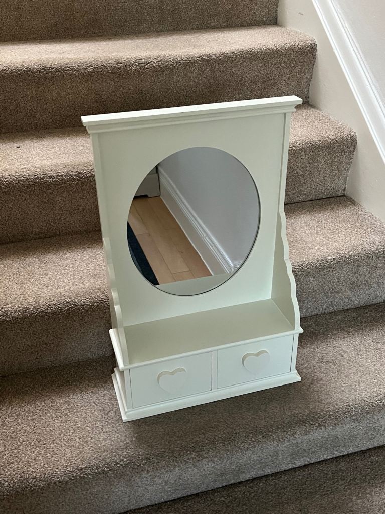 Freestanding dressing table mirror.
