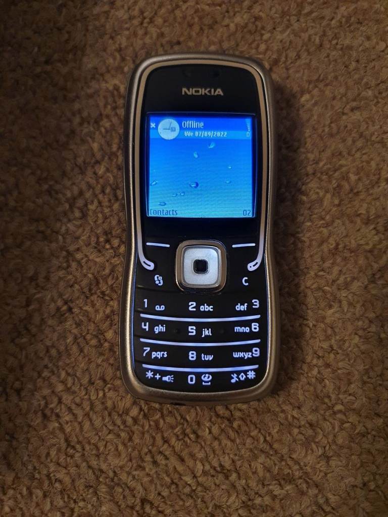Nokia 5500 Sport with box, charger manual and accessories shown - retro vintage