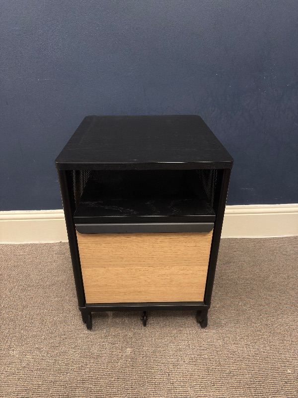Desk storage cabinet on castors