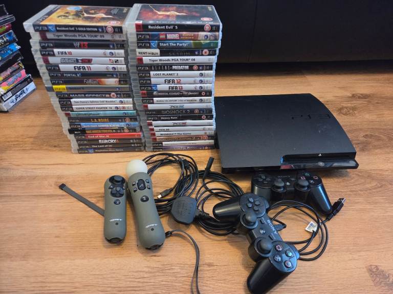 Sony PlayStation 3 Console with Games and Controllers