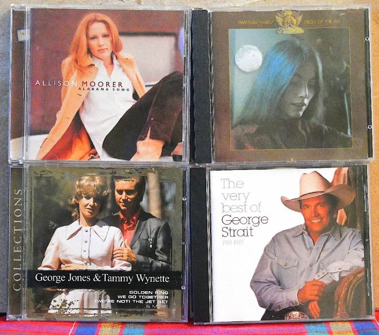 Eight country CDs