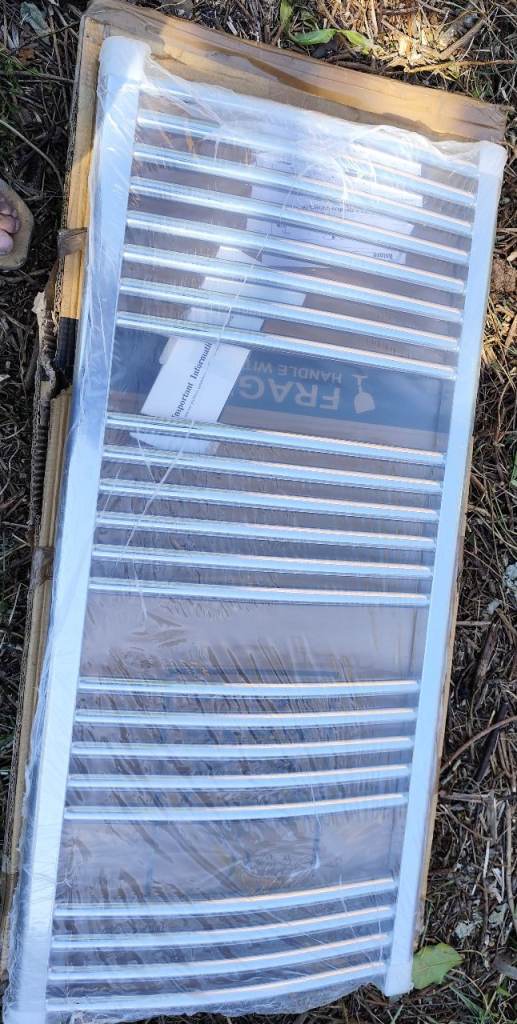 Curved chrome Bath Store radiator/ towel rail. New
