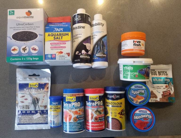 Aquarium food , treatments & test strips 