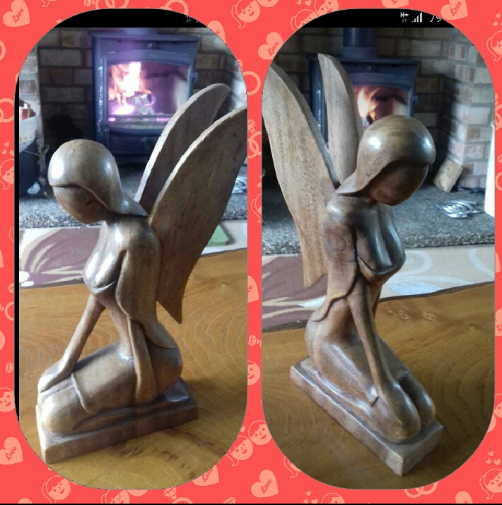 Wooden Seated angel and singing monk