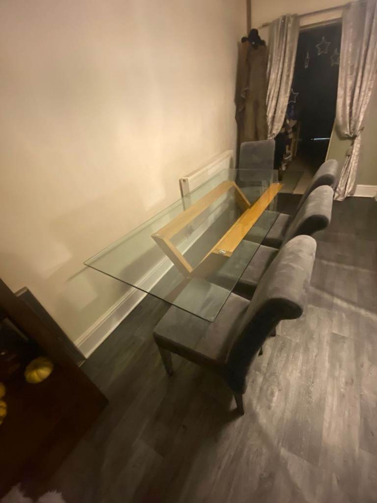Large glass table and 4 chairs 