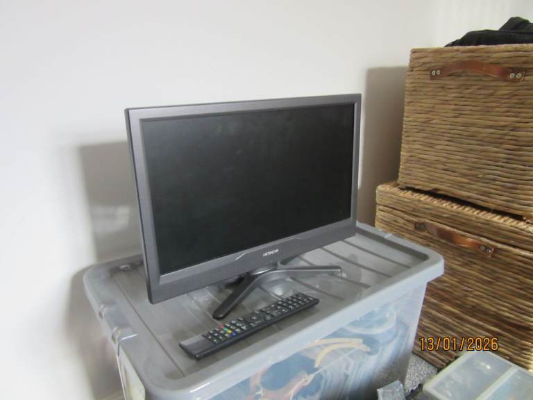 Hitachi 16"  with built in dvd player,works   perfectly,  with remote
