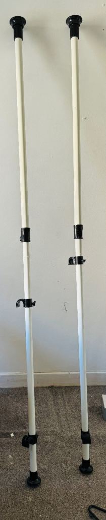 Curtain Rods: Metal, extending. Brand new. 