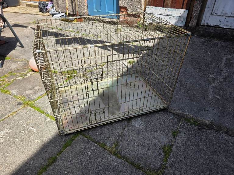 For sale 2 medium dog crates/ cages