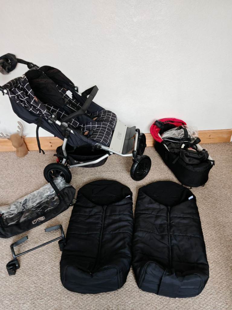 Mountain buggy duet double with carry cot 