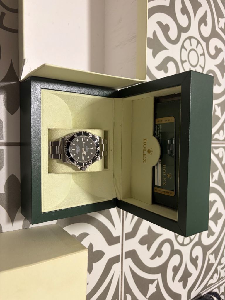 Rolex submariner non date box and papers 