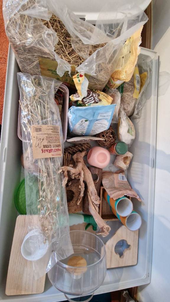 Hamster cage with alot of stuff