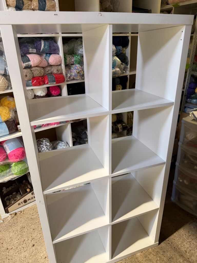 Solid white cube storage unit
