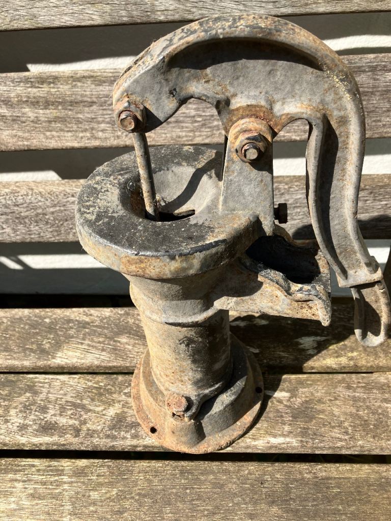 Vintage water pump for garden feature