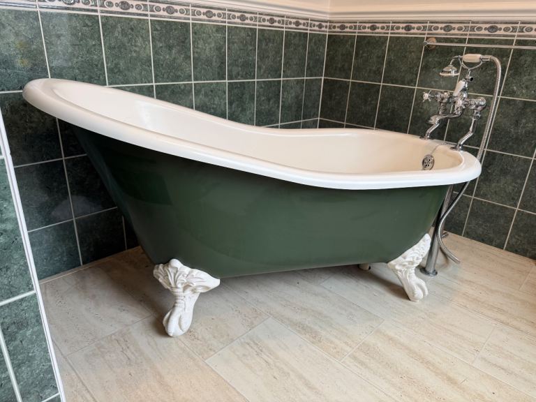 Freestanding bath and taps Victoria and Albert