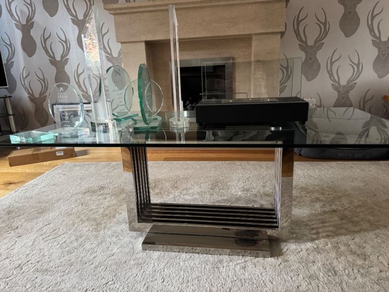 Coffee table with chrome base