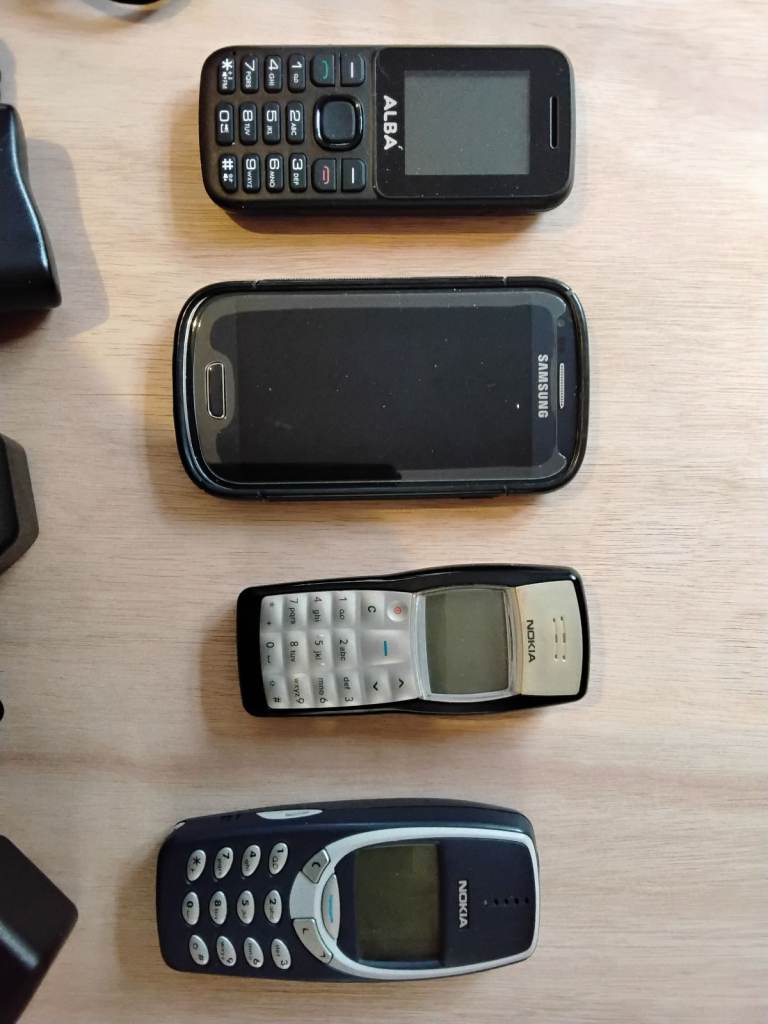 Four old mobile phones