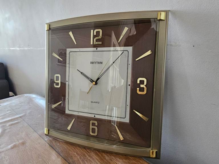 Rhythm Quartz Wall Clock - Brown and Gold, Good Condition