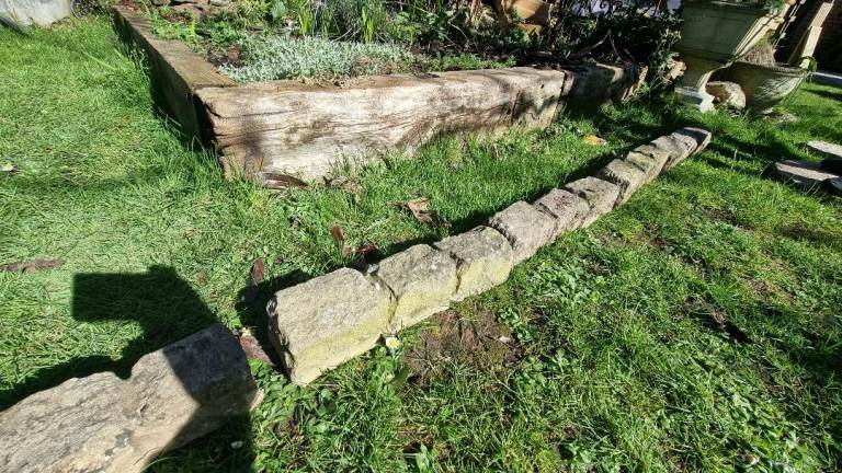 Reclaimed garden edging stones.  