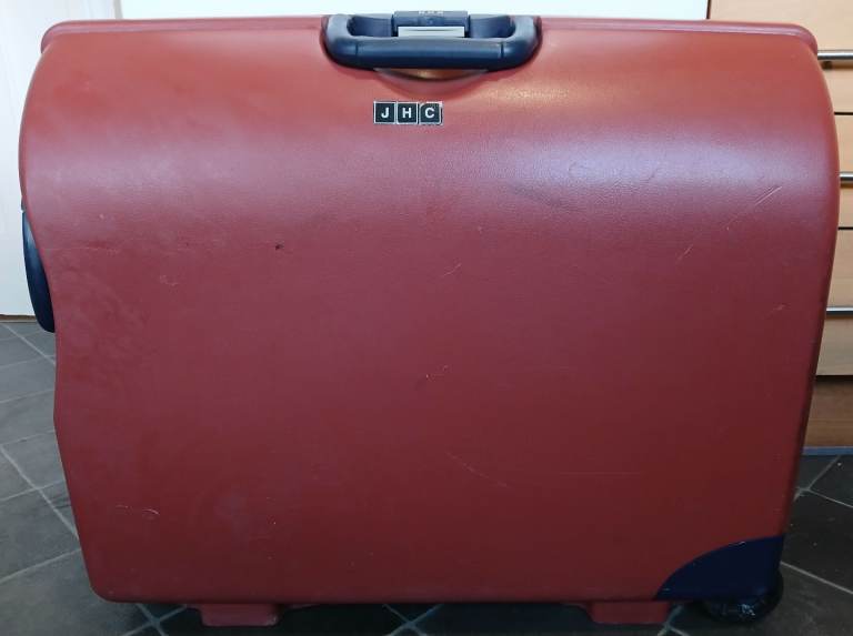 Saxoline JHC heavy duty hard brown pull-along 2 wheel suitcase with combination locking system