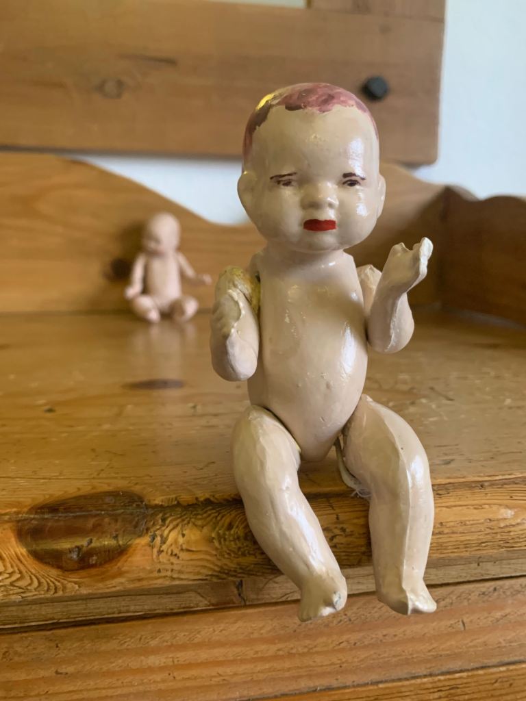 2 vintage dolls, 1 from 1985, 1 eatlier bisque doll