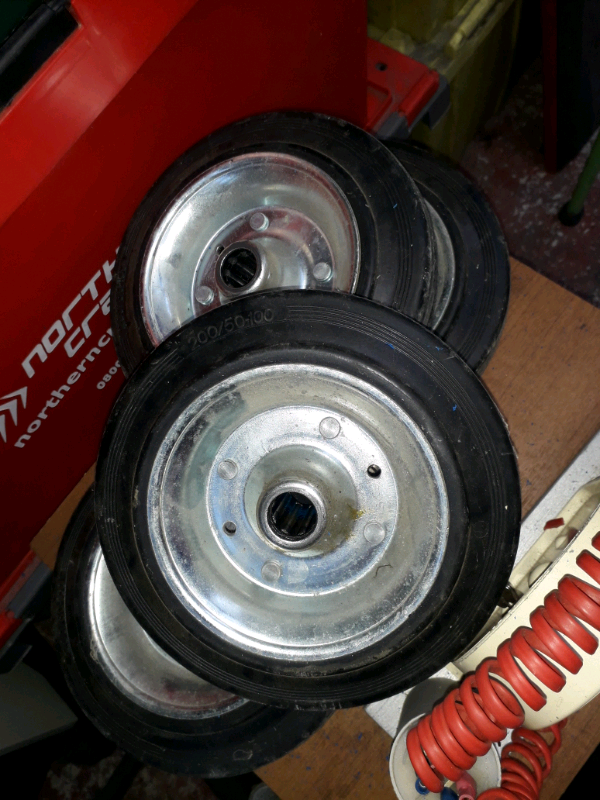 4 hard rubber wheels as PHOTOS with roller bearings 