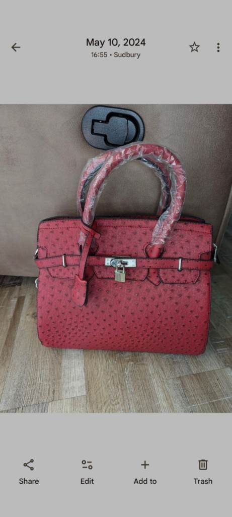 Brand New Red Ostrich Print Handbag with Lock