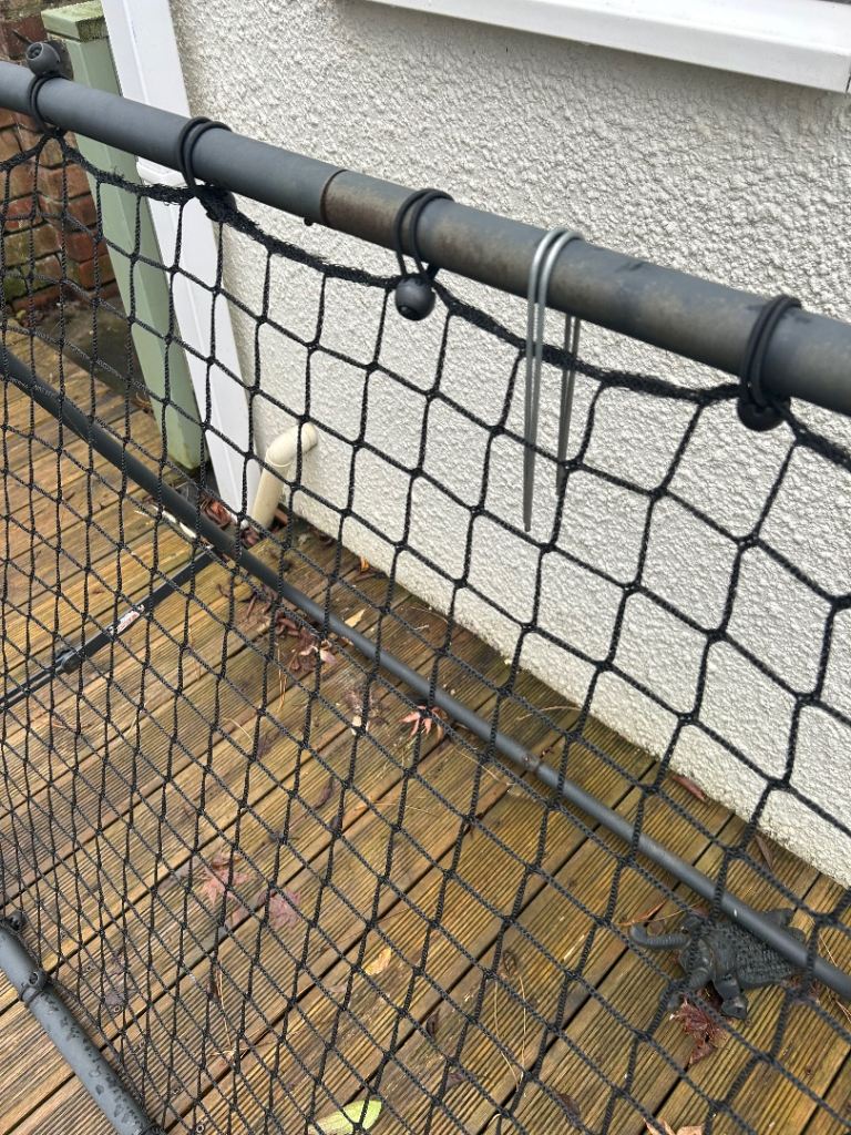 Black football rebounder